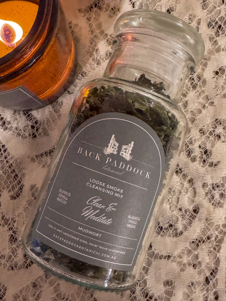 Glass bottle of mugwort loose smoke cleansing mix