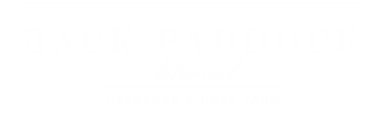 White Black Paddock Botanical Logo on black background