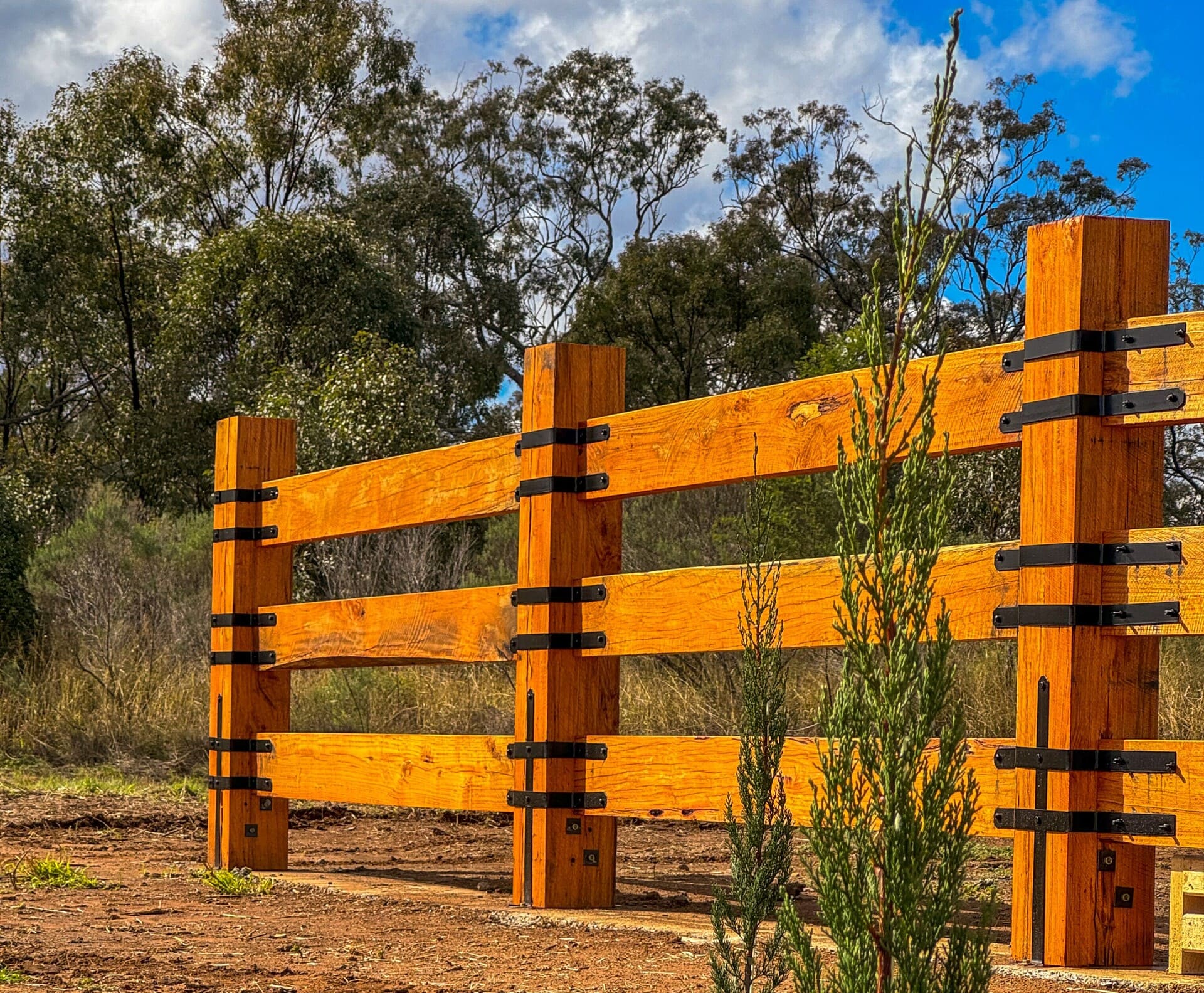 Wooden entry fence to Back Paddock Botanical
